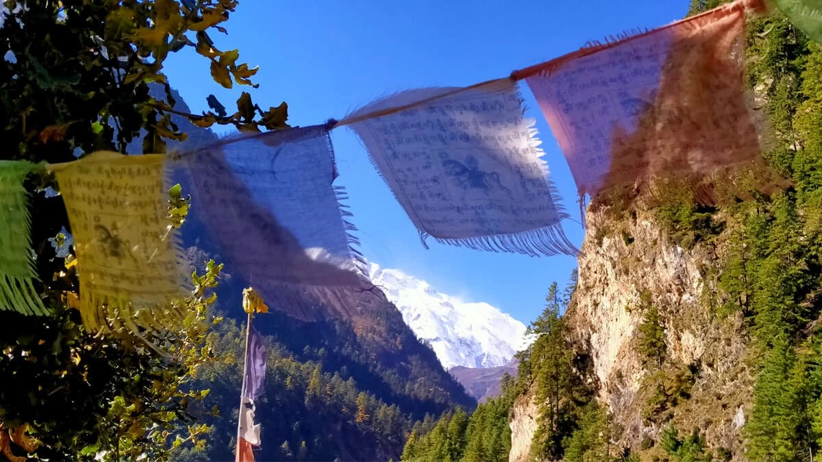 passing Jagat with Prayer flags