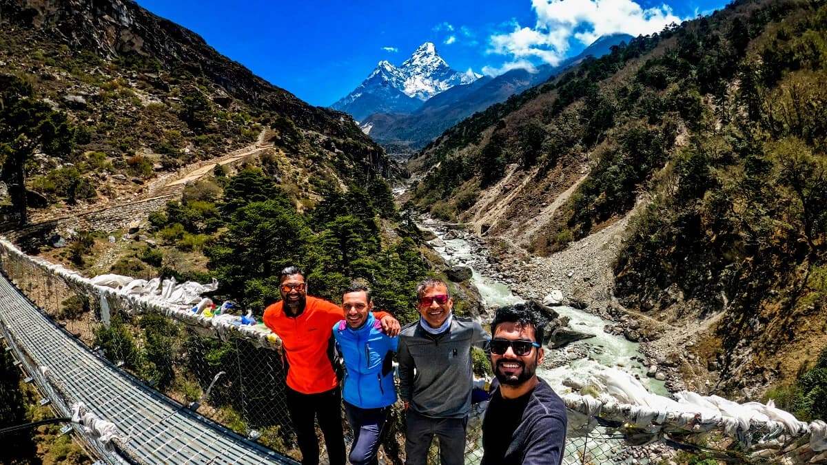 happy-clients-with-amadablam-background